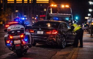 Do I need a lawyer for my first DUI in California police investigating a nighttime DUI accident scene involving a luxury vehicle