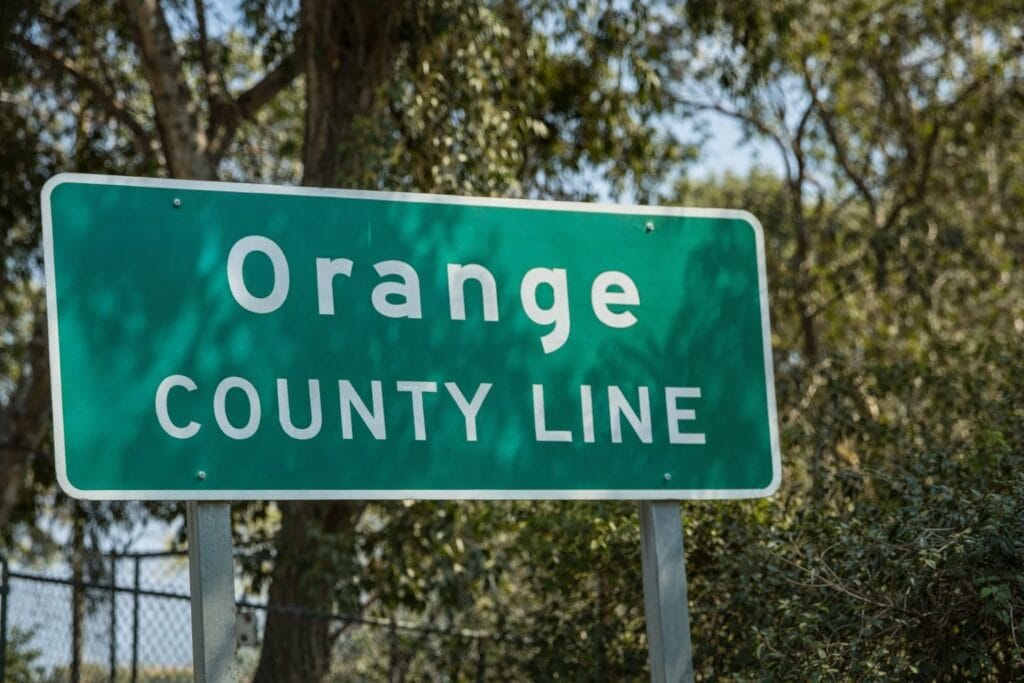 Orange County line road sign representing DUI defense cases handled throughout Orange County California